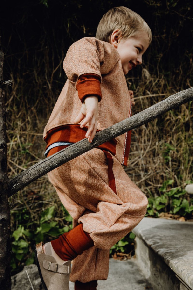 JOGGER AUS WOLLE FISCHGRÄT TERRACOTTA
